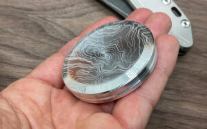 Read more about the article MetonBoss Topographic Engraved Worry Coin